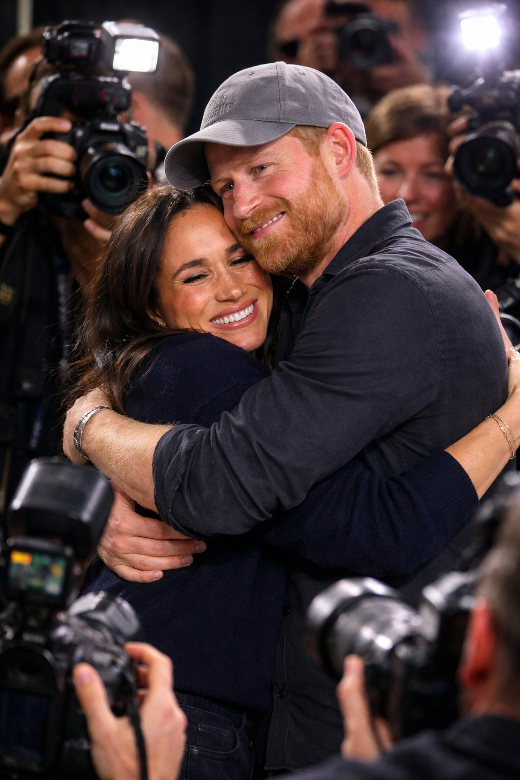 Meghan Accused of ‘Performing’ Marriage Courtside While Cameras Roll