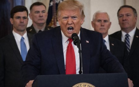 Democrats wait for a call that hasn’t come while the US builds up forces near Iran and Israel raises alert levels. Meanwhile, nuclear facilities are fortified and Epstein’s former associate sits for deposition.